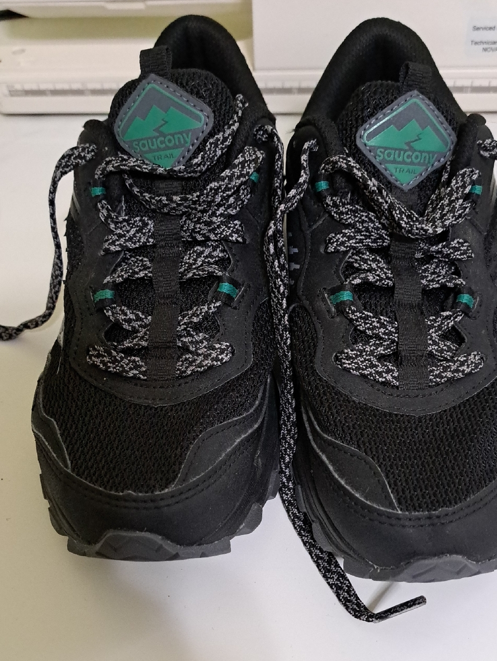 Saucony Womens Black Sneakers with Teal Logo Accents